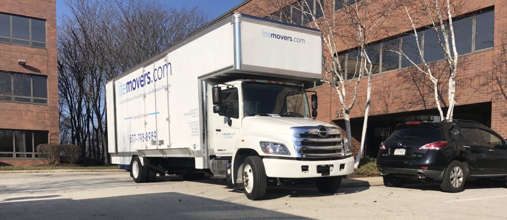 LiteMovers commercial moving truck staged at an office park for an office relocation